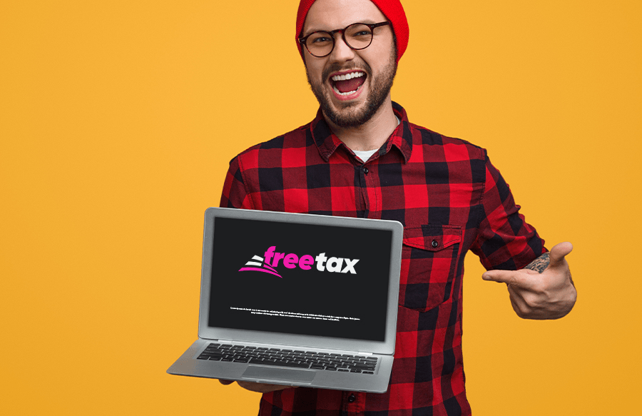 man showing laptop with FreeTax logo