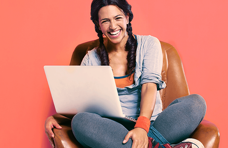 smiling woman with laptop